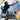 Tips for mural painting - artist painting a mural outside with Liquitex Basics Acrylic Fluid